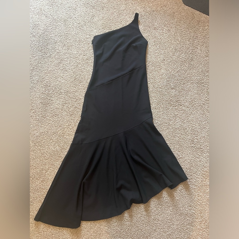 Worn once for 4 hours. Washed once on delicate.  Like new black dress.